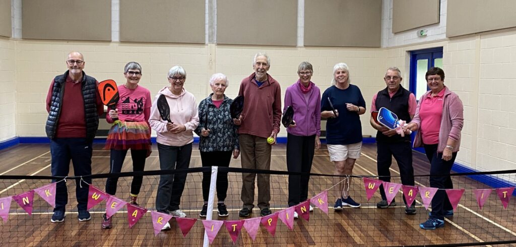 Pickle ball players dressed up in pink for charity in Breast Awareness week