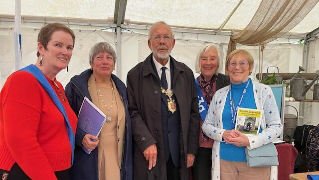 Chair Samantha Ridgway and other members of SLu3a meet Kendal Mayor Councillor Richard Sutton at Beetham Garden Centre