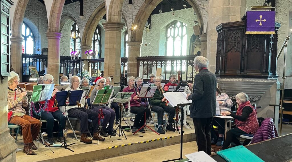 Recorder ensemble -whole group performing in the Parish Church